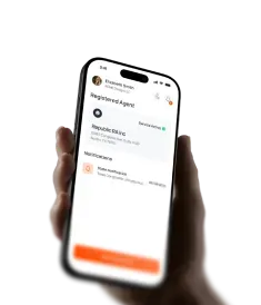 Hand holding a phone showing an active Registered Agent service and state notifications