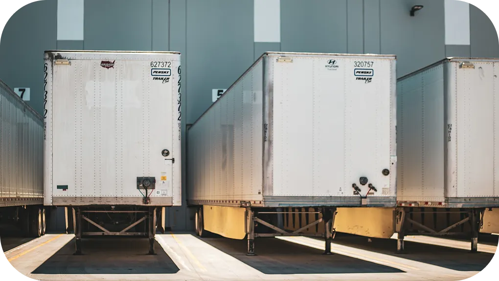 Freight Trailers Parked At Loading Dock Mobile