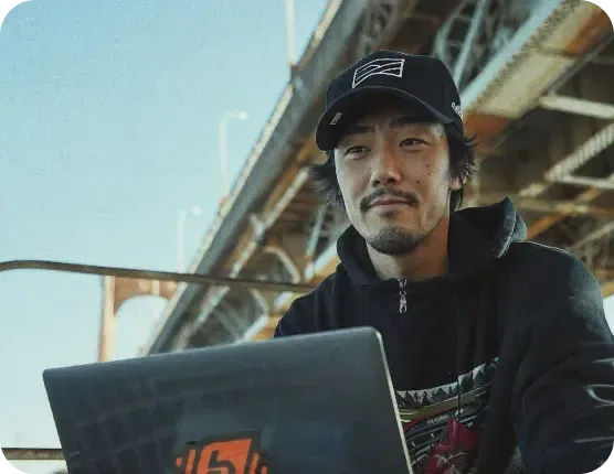 Man Working Outside With A Laptop 1