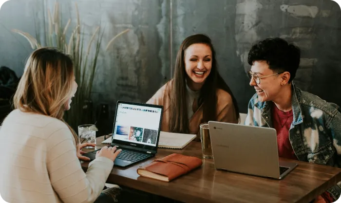 Friends-Sitting-With-Laptops