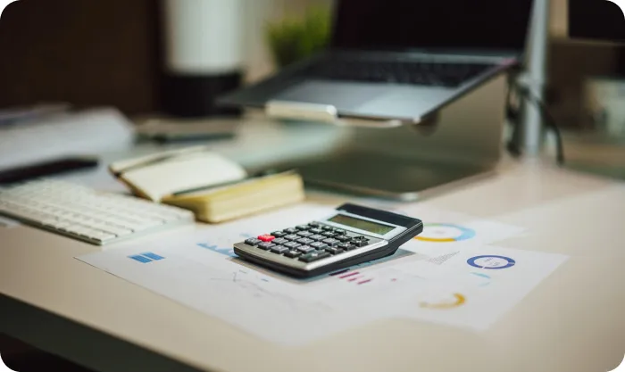 a-tablet-computer-sitting-on-top-of-a-bed