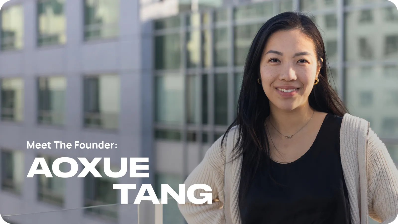 Founder Aoxue standing on the balcony with other buildings in the background. Title: Meet the Founder.