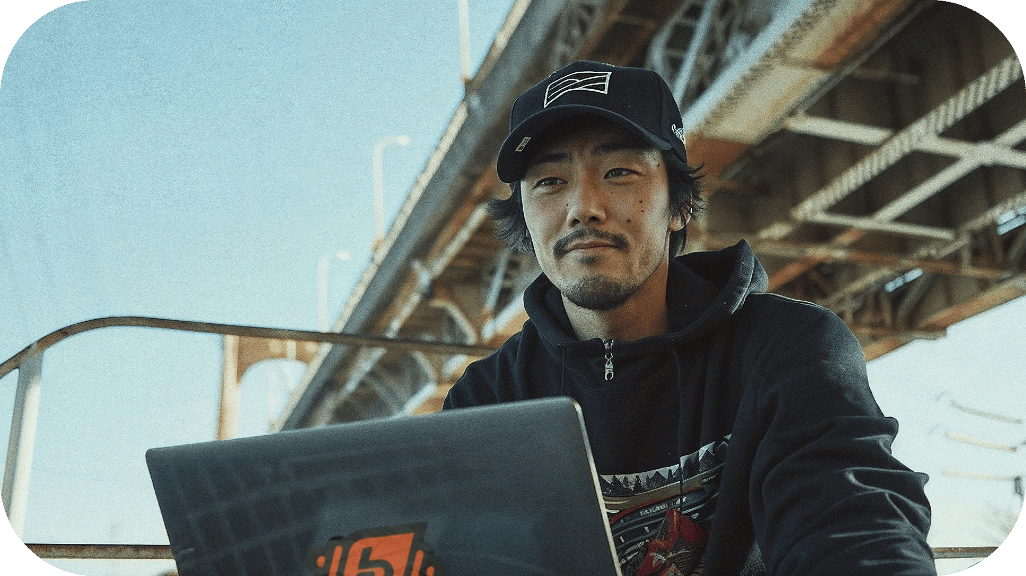 A Chinese Professional Using Laptop Hero Mobile