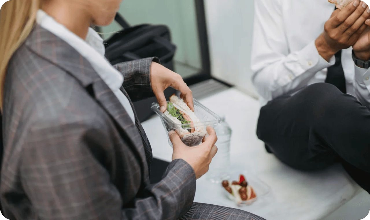 Person Eating A Sandwich