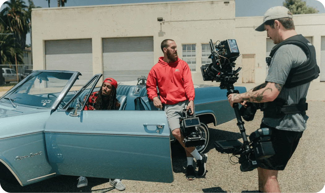 Filming Scene With Classic Car And Crew