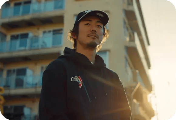 Man In Black Hoodie And Black Cap Standing