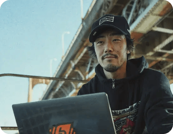 Man Working Outside With A Laptop 1