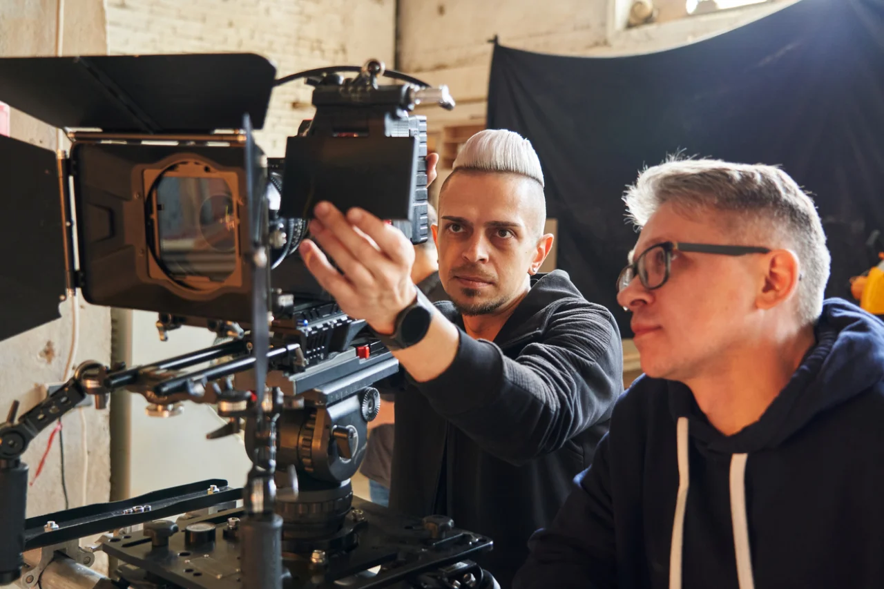Video Production Team Setting Up Camera