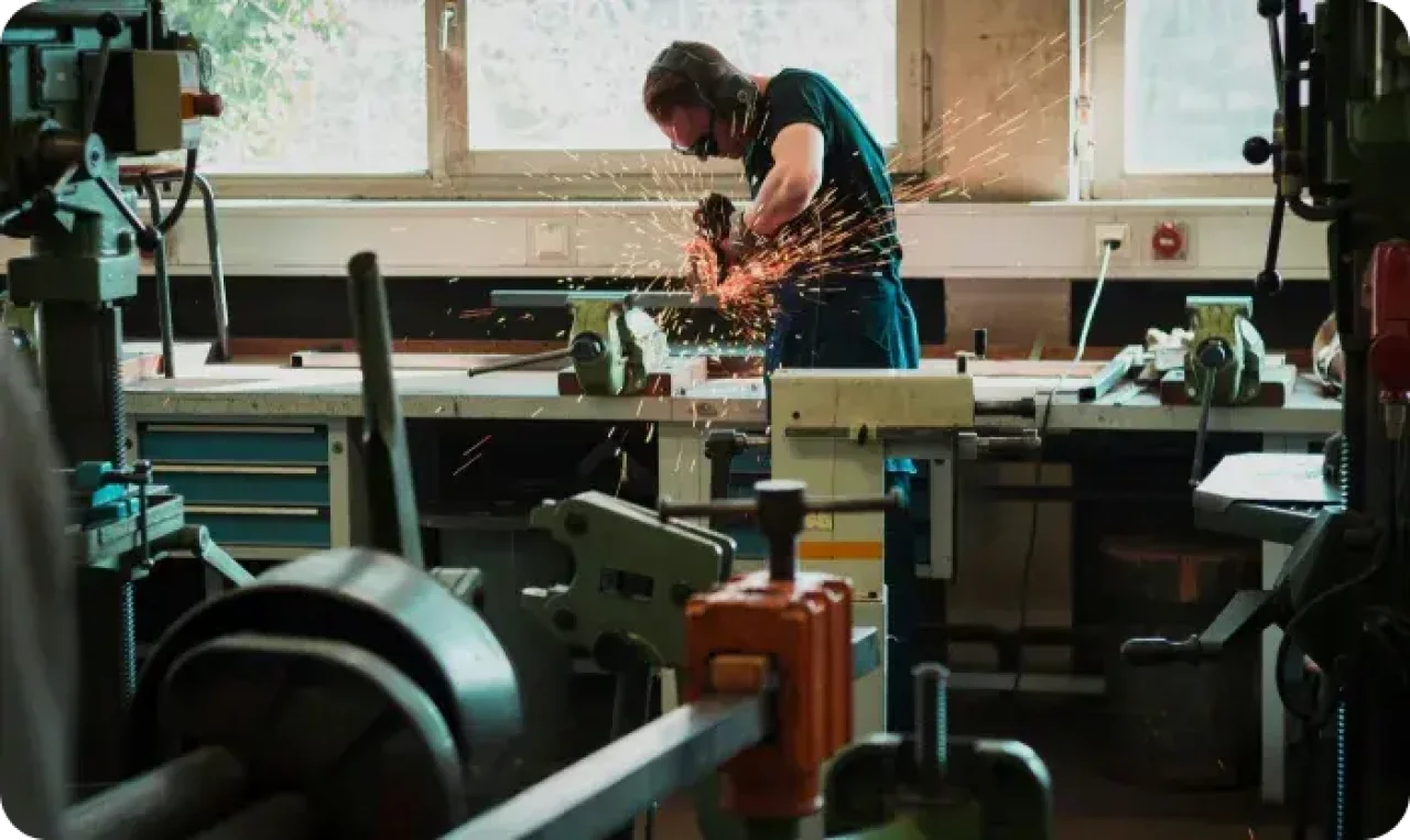 A man operates a machine