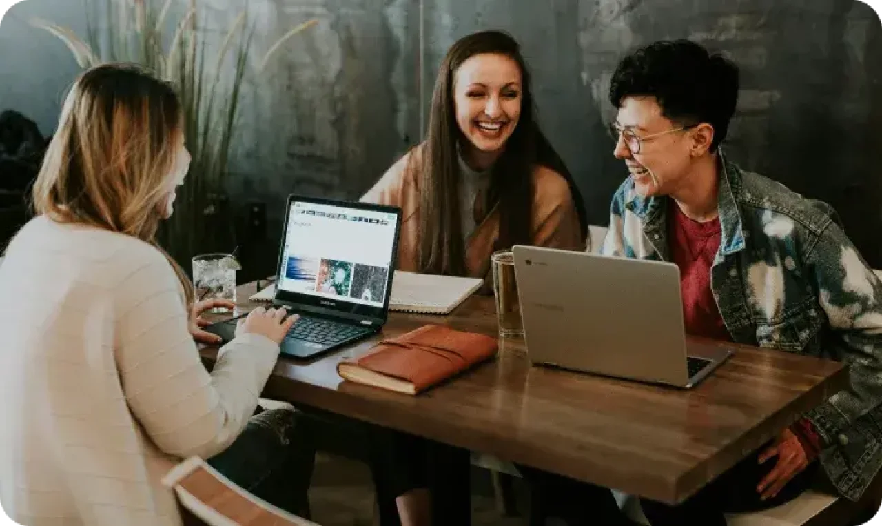Three people working together