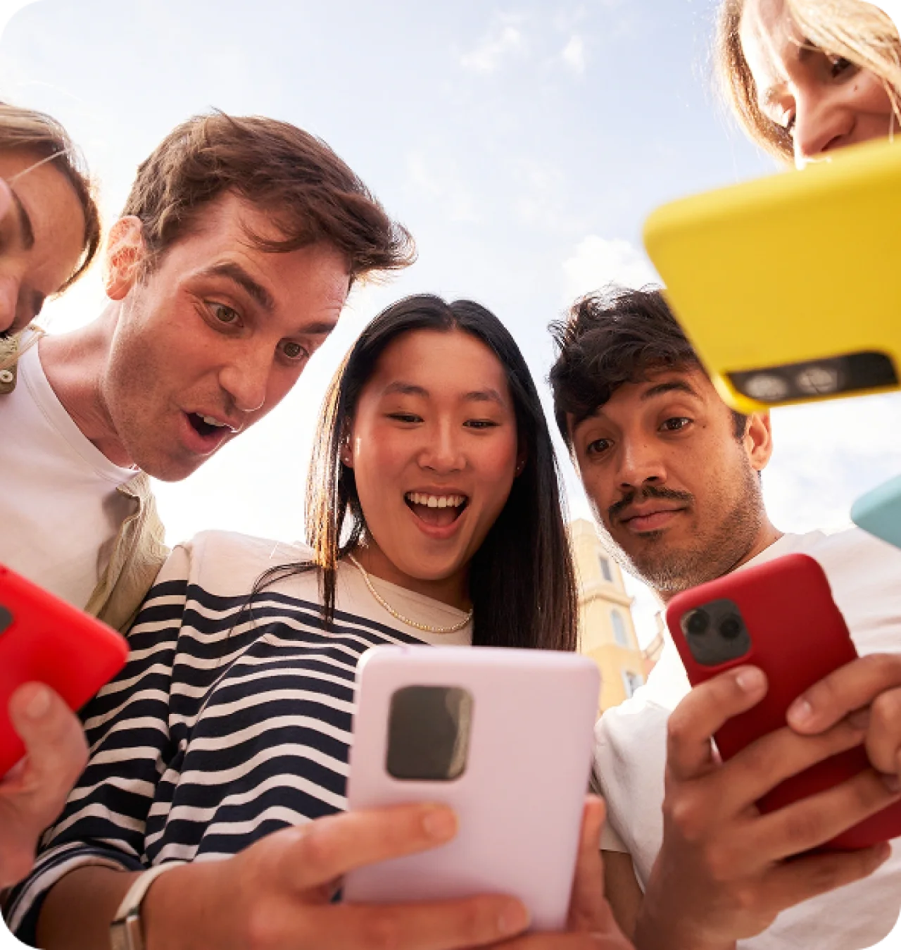 Diverse Group Young People Circle Staring Surprise Cell Phone Screen Together Outdoors