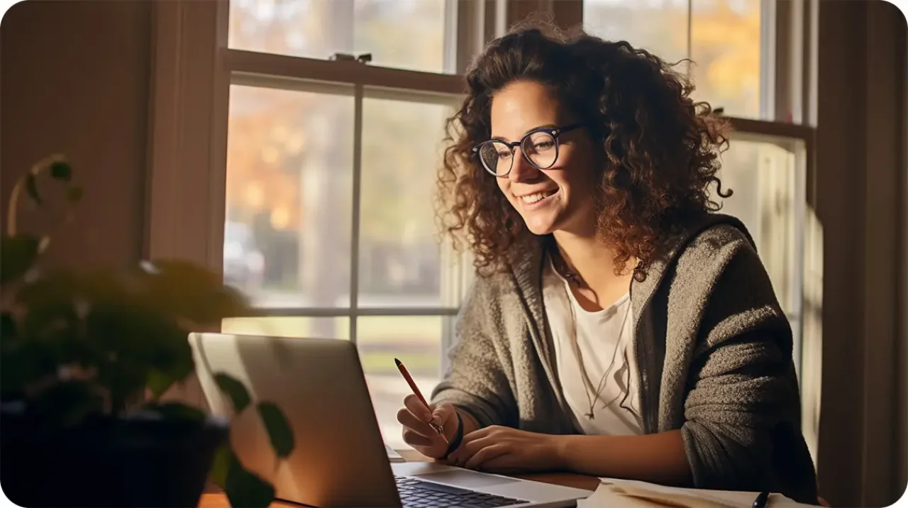 Woman With Glasses Smiling Working