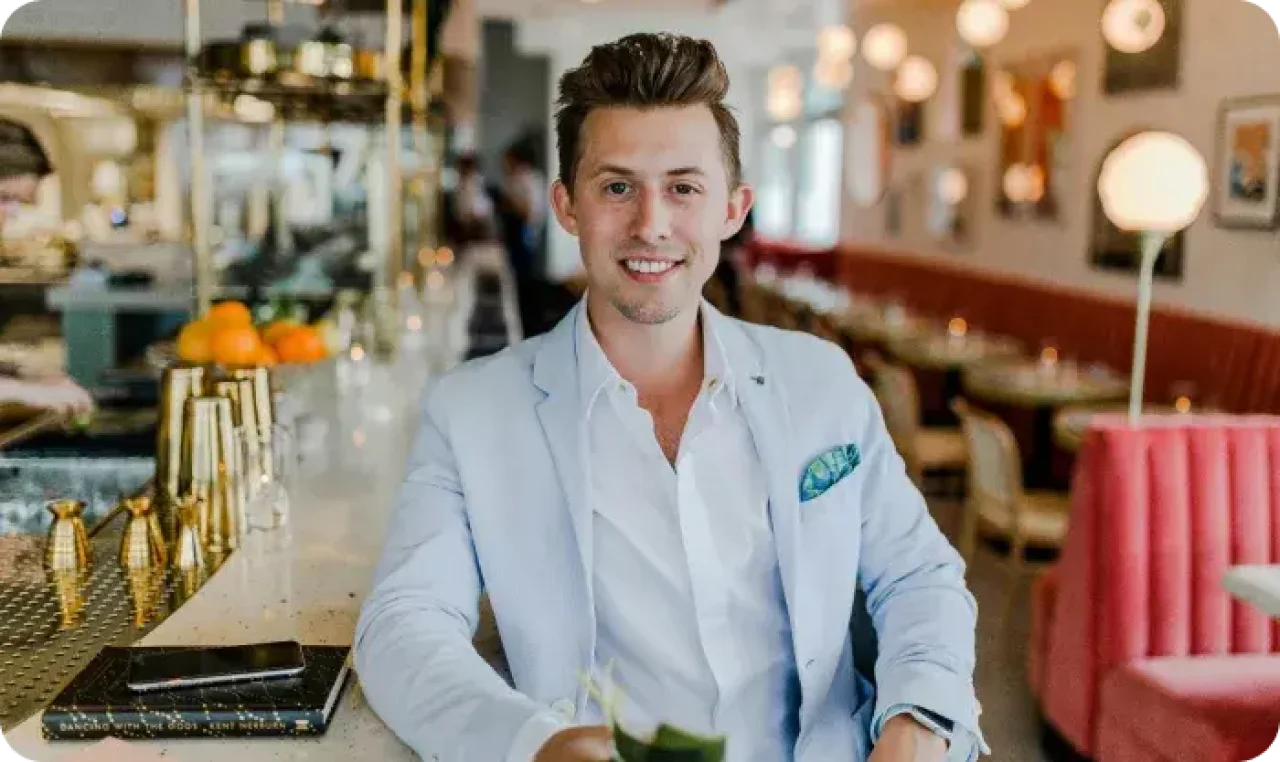 One man smiling in a restaurant