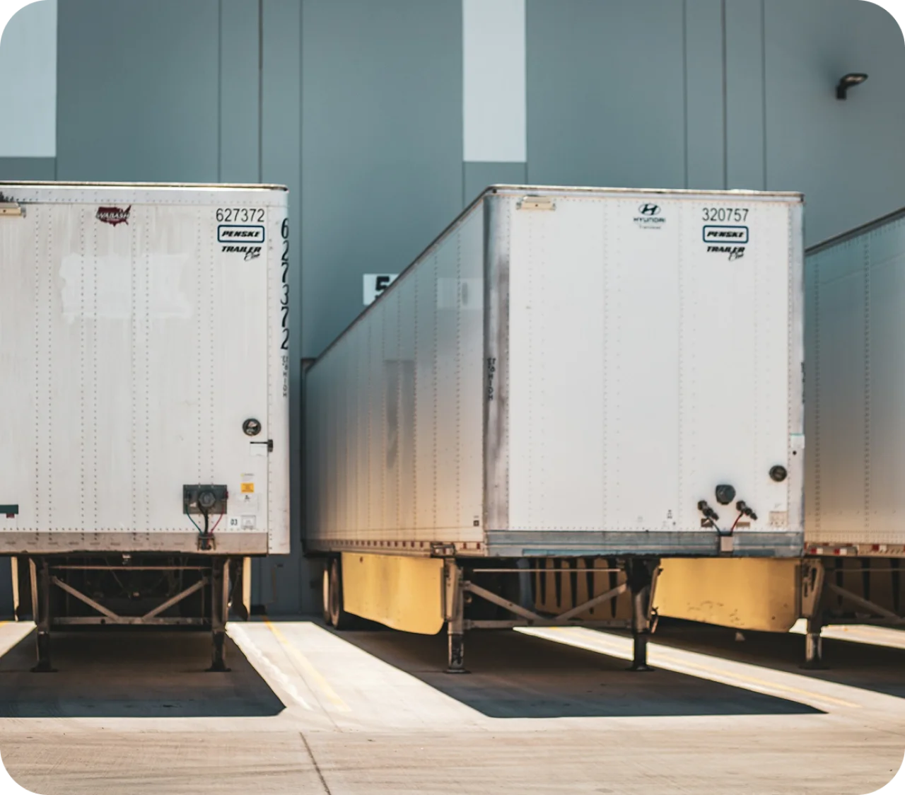 Freight Trailers Parked At Loading Dock